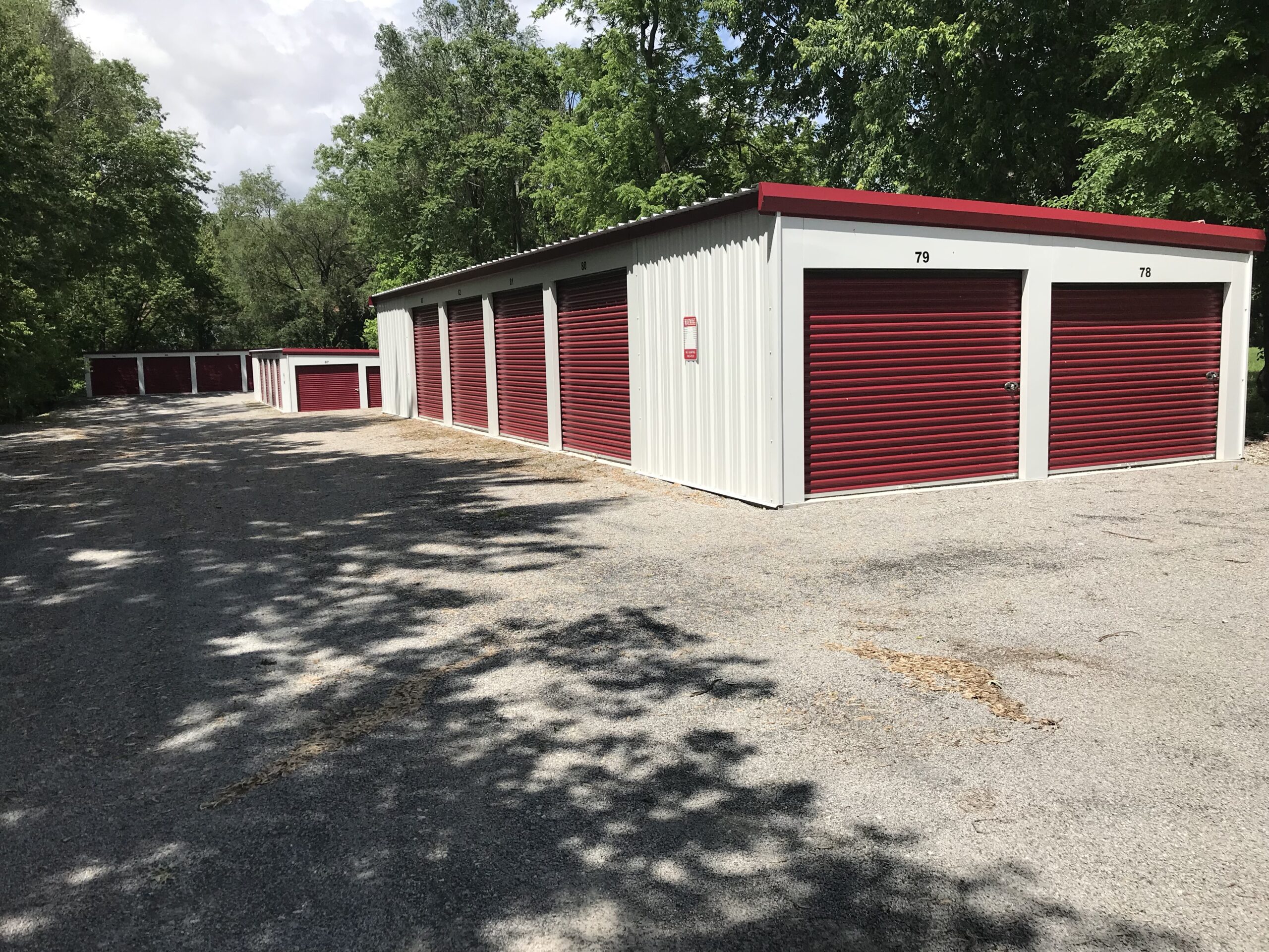 Storage units surrounded by trees